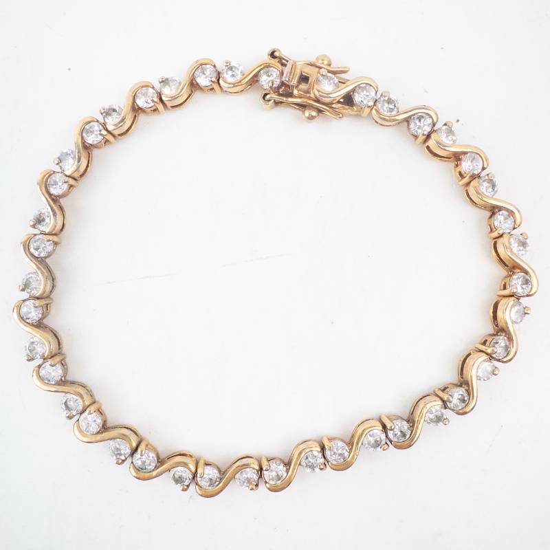 lot 208 image: Gold-Tone Wave-Link Bracelet with Round-Cut Stones - 8-Inch Length
