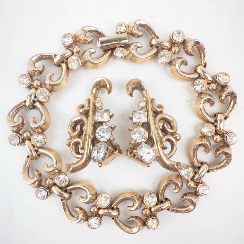lot 210 image: Trifari Gold-Tone Bracelet & Earrings Set with Crystals