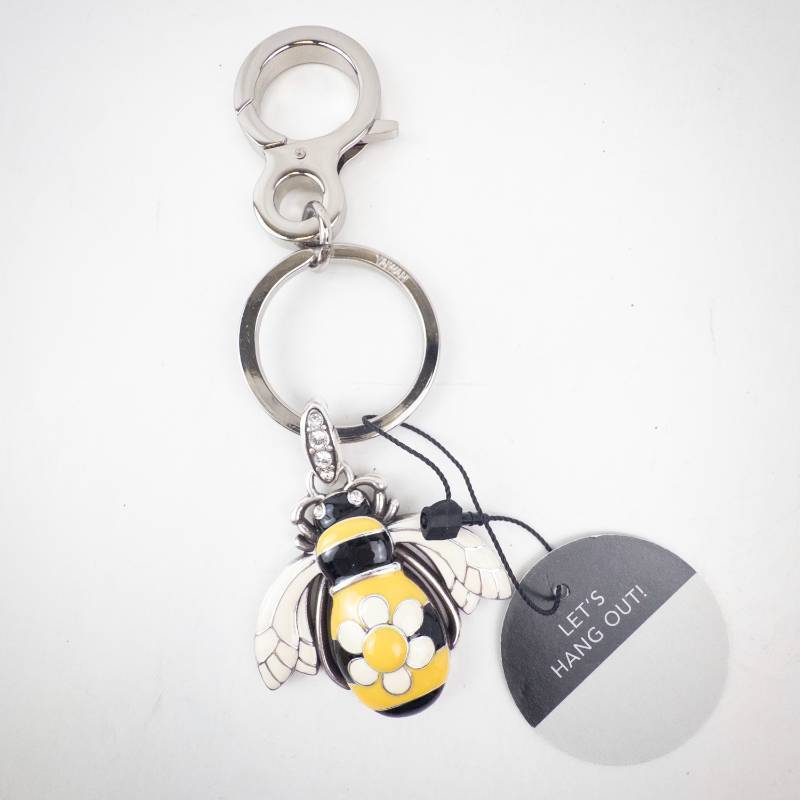 lot 224 image: Brighton Lets Hang Out Bee Keychain Charm with Flower Pendant and Fabric Pouch