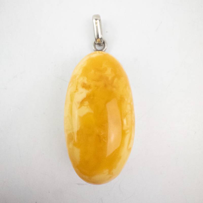 lot 53 image: Large Butterscotch Amber Pendant - 43x23mm
