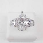 Lady’s 14K White Gold Synthetic Cubic Zirconia Ring with Marquise Center. Size 10.