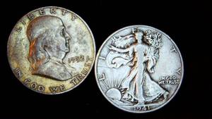 lot 42 image: (2) Circulated Silver Half Dollars