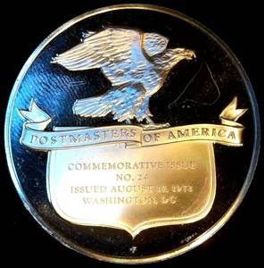 lot 86 image: Janet Lynn 1972 Olympics Sterling Silver Medallion #24 Postmasters, .80 OzT  .925 Fine, milk spots, tougher find