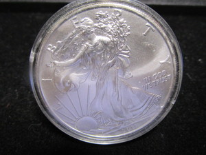 lot 55 image: 2011 American Eagle $1 Silver Coin