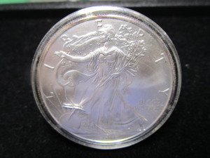 lot 57 image: 2011 American Eagle $1 Silver Coin