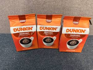 lot 65 image: 3 Bags Of Dunkin Hazelnut Coffee