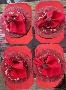 lot 19 image: Table Setting for 4 - Napkins, Napkin Rings, Plates, Chargers & Placemats