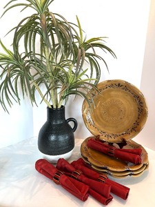 lot 28 image: Roma Antica Hand Painted Dinnerware Plates, Cloth Napkins, Napkin Rings, Faux Plant in Vessel