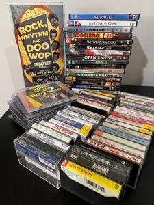 lot 122 image: Assorted DVDs & VHS Lot - Hoosiers, We Were Soldiers, Seabiscuit, Open Range & More