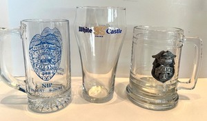 lot 137 image: Harley-Davidson Police 1 Mug, White Castle 95 Years Glass & NIP Police Mug