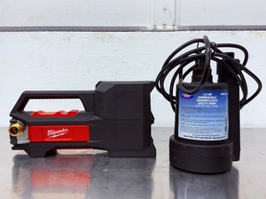 lot 56 image: Lot of 2 Milwaukee M18 Cordless Transfer Pump &amp Superior 14 HP Submersible Utility Pump