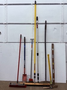 lot 82 image: Contractor Tool Lot 8-Piece Assortment of Shovels, Levels, Rakes, Brooms, and Scrapers