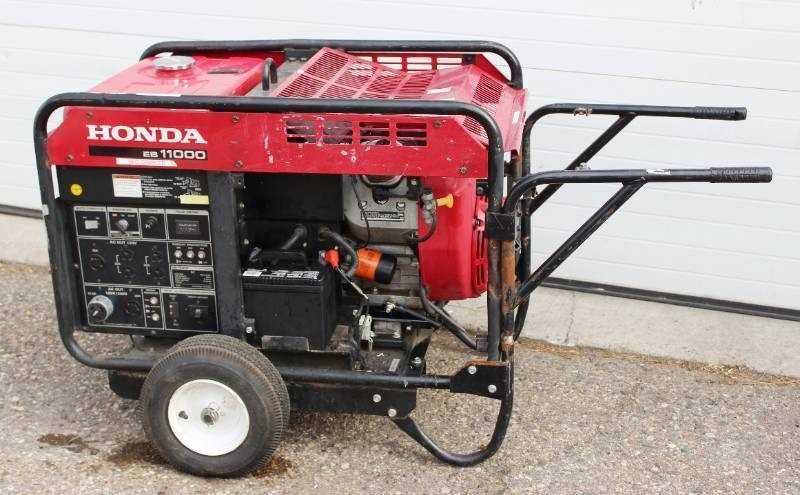 lot 3 image: Honda EB 11000 Commercial-Grade Portable Conventional Gasoline 10,000-Watt Power Generator - $7,000  Grainger