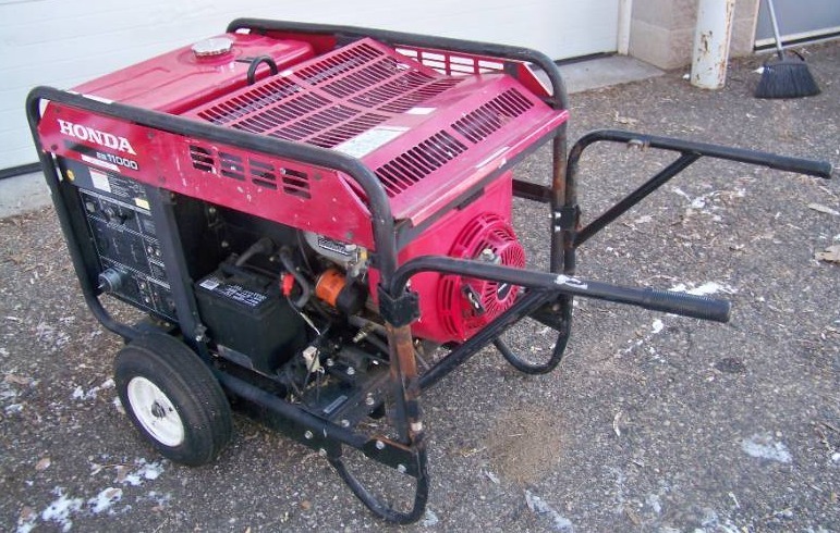 lot 3 image: Honda EB 11000 Commercial-Grade Portable Conventional Gasoline with Electric Start 10,000-Watt Power Generator - $7,000  Grainger