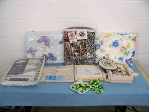 lot 37 image: Miscellaneous Throw  Blanket  Trellis  Bedding  Kitchen Towel and Hot Pad and Notepad Holder - some items NEW in Original Packaging