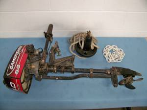 lot 45 image: Game Fisher 3 HP Outboard Boat Motor, Anchor and Small Section of Chain