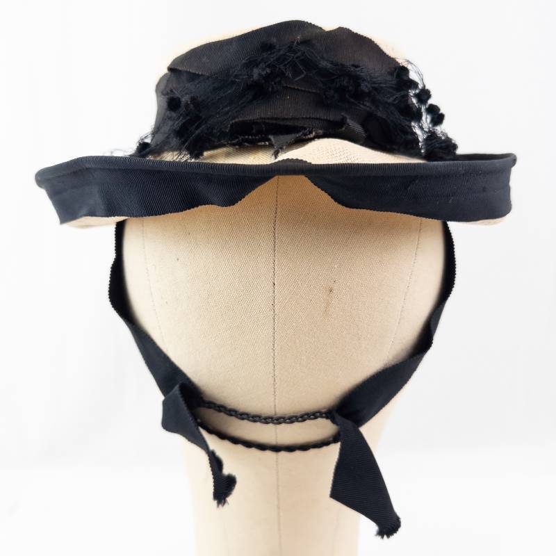 lot 103 image: Rolton Chicago Vintage Hat - Beige Straw with Black Net Veil & Ribbon. Size 22