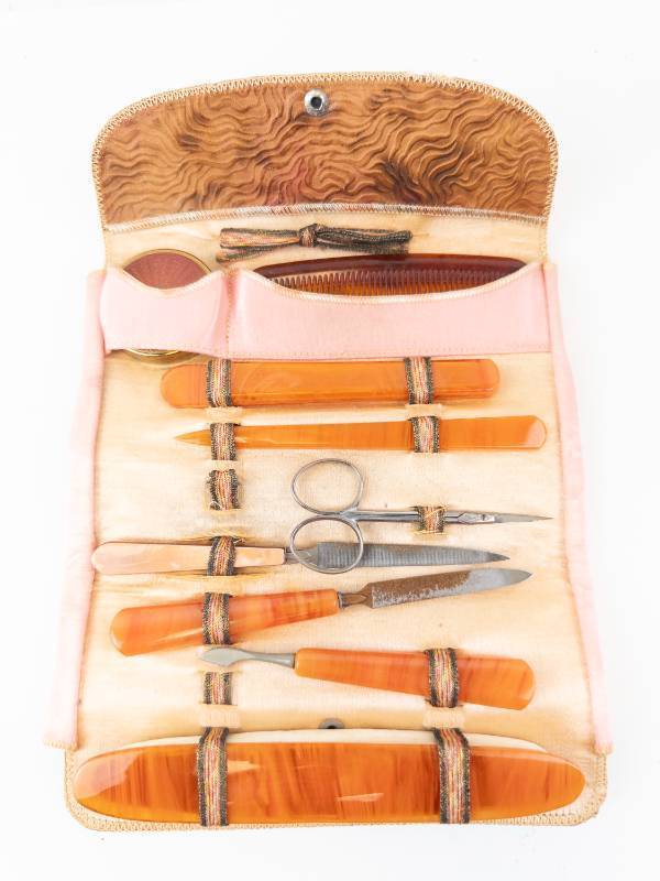 lot 112 image: Manicure Set - Vintage Brown Leather Roll with Orange-Handled Tools