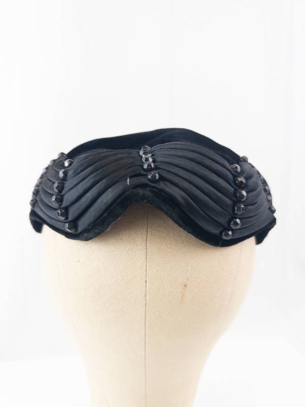 lot 135 image: Black Satin Beaded Headband Fascinator