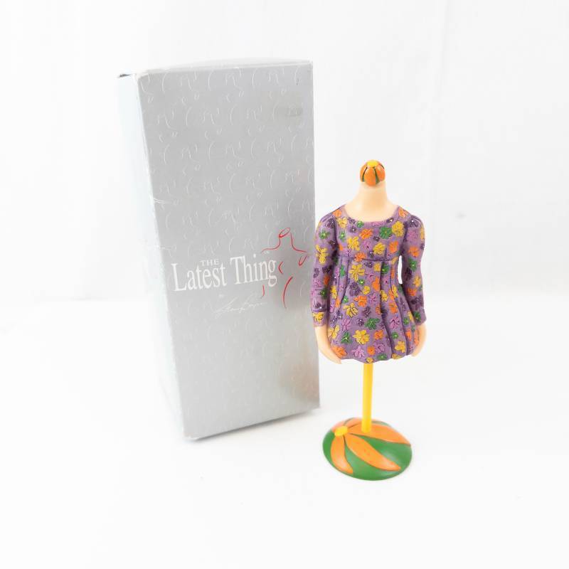 lot 194 image: Miniature The Latest Thing Purple Floral Dress Miniature Fashion Doll on Stand - Box Included