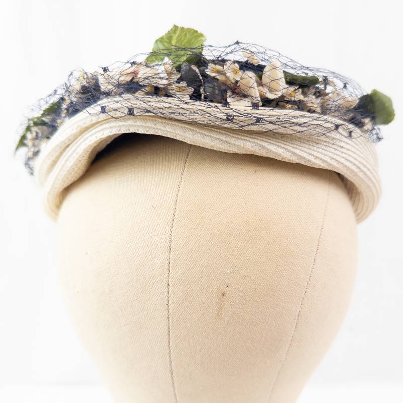 lot 25 image: Navy Straw Fascinator Hat - Floral Netting, White Flowers & Green Leaves
