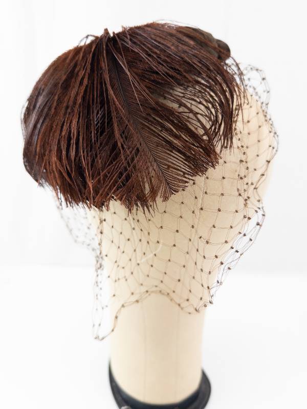lot 65 image: Hat - Vintage Black Velvet Cloche with Brown Feather & Net Veil