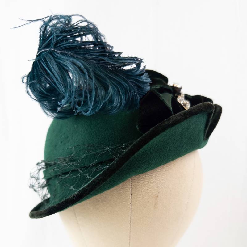 lot 67 image: Mademoiselle Cloche Hat - Green Felt with Teal Feather & Velvet Ribbon Trim