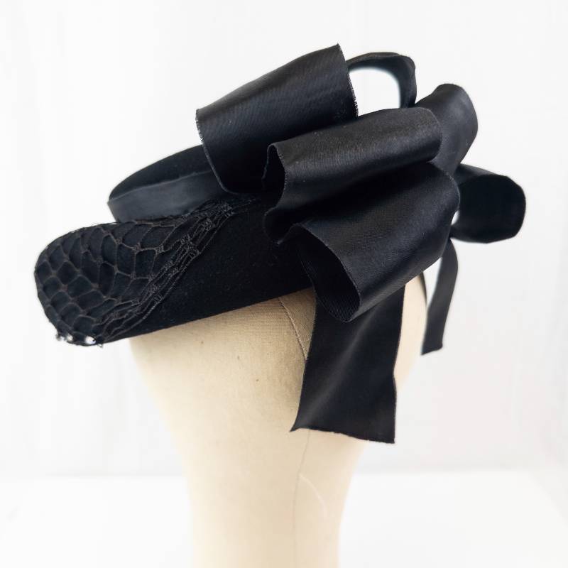 lot 82 image: Merrimac Hat Corp Wool Pillbox Hat with Netting & Satin Bow - Black