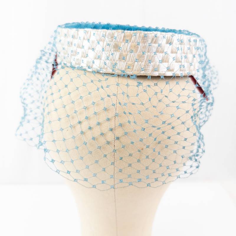lot 84 image: Jo-Leen Creation Fascinator Headpiece - Blue Net Veil with Hair Comb