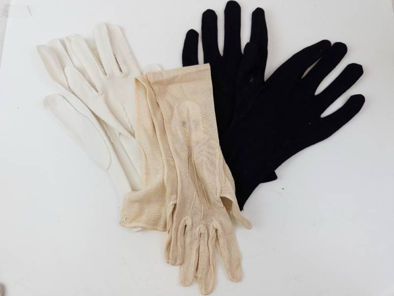 lot 99 image: Glove Lot - White Satin Gloves, Beige Mesh Gloves, Black Knit Dress Gloves - Assorted Sizes