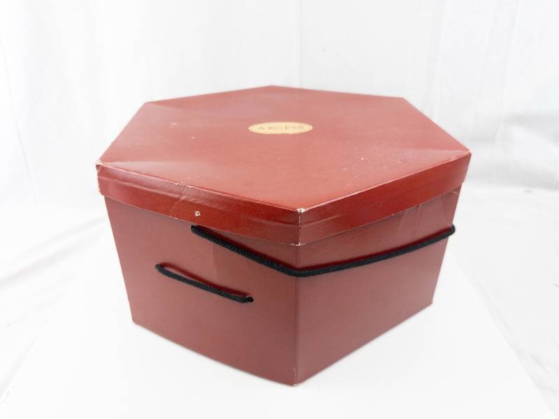lot 240 image: AXCESS - Hexagonal Red GiftHat Box with Lid & Black Rope Handles