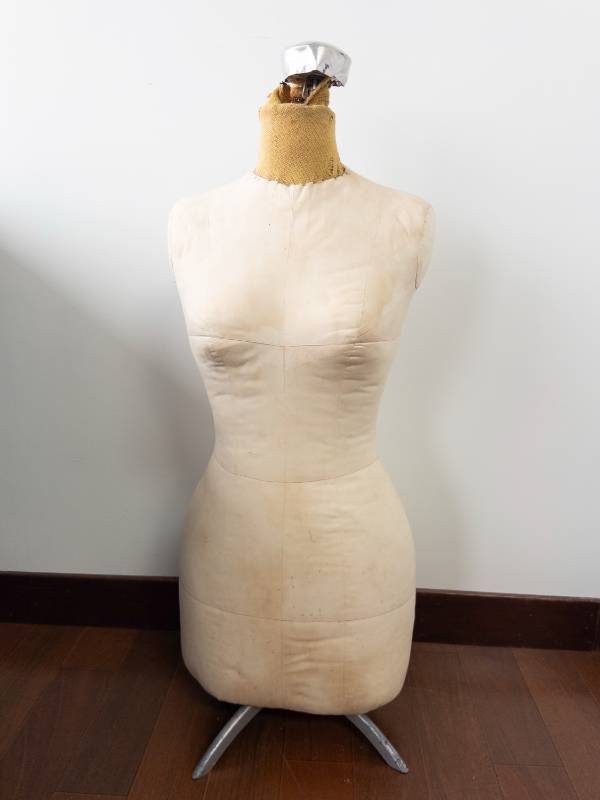 lot 214 image: Beige Dress Form Mannequin with Burlap Neck Wrap and 3-Leg Metal Base