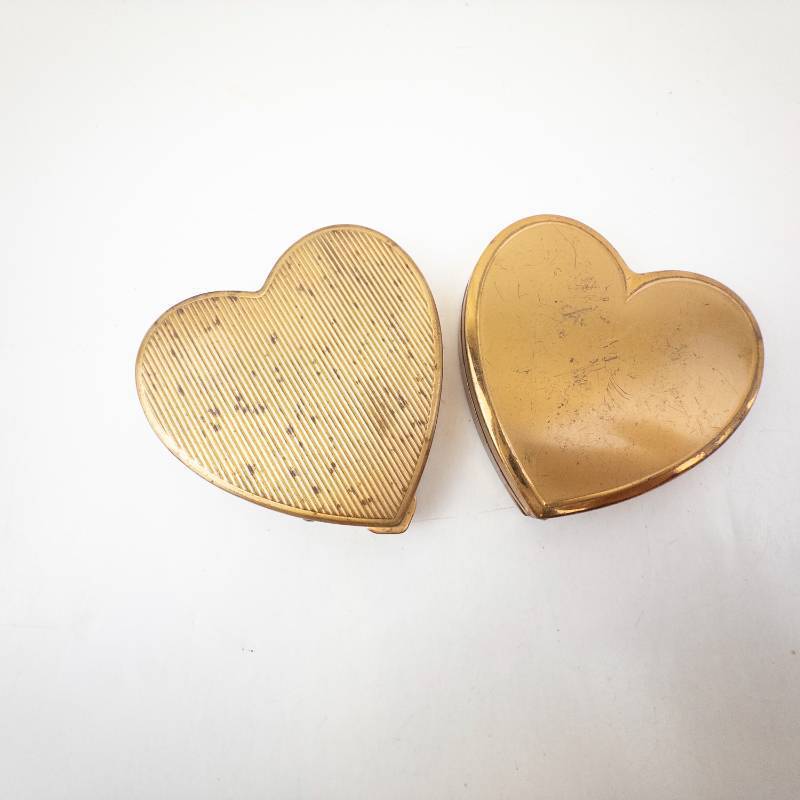 lot 283 image: Pair of Heart-Shaped Gold-Tone Powder Compacts