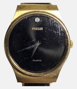 lot 24 image: Collectable  Phazer Quartz watch from Sears & Roebuck Co.