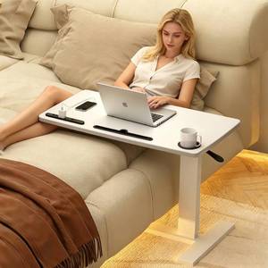 Adjustable overbed table for hospital or home. It has wheels and a USB port to charge your devices.