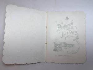 lot 98 image: Perfumed Petals Vintage Card Album with Embossed Floral Border and Vase Illustration