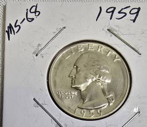 lot 63 image: 1959 Quarter, graded MS-68.
