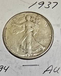 lot 67 image: 1937 Walking Liberty Half Dollar in Almost Uncirculated (AU) condition.