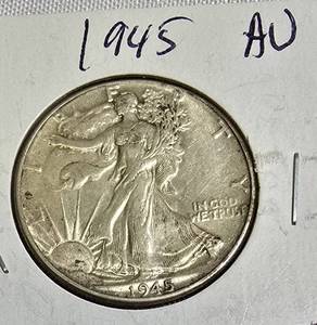 lot 68 image: 1945 Walking Liberty Half Dollar in Almost Uncirculated (AU) condition.