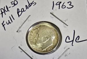 lot 77 image: 1963 Dime, AU-50, with Full Bands and captivating color contrast.
