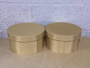 lot 202 image: LOT OF 2 Sarahs Hat Boxes Classic Gold Hat Box � 8.75 x 4.5 (Dia. x Ht.) Handmade in USA � Odorless Non-Toxic Adhesive, Cording Handle � Premium Storage for Hats & Accessories