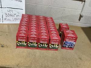 lot 336 image: LOT OF 44 Holiday Style IndoorOutdoor Clear Bulbs, Green Wire (42) & Icicle Lights (2)