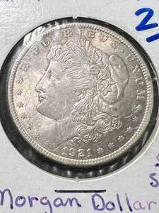 lot 07 image: 1921 US MORGAN SILVER DOLLAR UNC