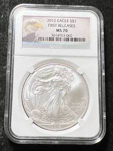 lot 11 image: 2012 AMERICAN SILVER EAGLE NGC MS70