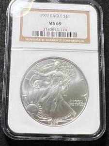lot 20 image: 1997 AMERICAN SILVER EAGLE NGC MS69
