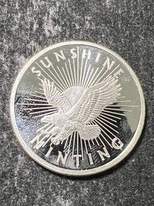 lot 38 image: HALF TROY OZ .999 FINE SILVER SUNSHINE MINTING ROUND