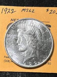 lot 45 image: 1922 US PEACE SILVER DOLLAR MS62