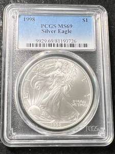 lot 54 image: 1998 AMERICAN SILVER EAGLE PCGS MS69