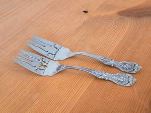 lot 1111 image: Lot of (2) 8 154-grams (total) Sterling Silver Pierced Fish  Cold Meat Serving Forks - Francis I by Reed & Barton