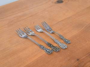 lot 1116 image: Lot of (4) 95-grams (total) Sterling Silver Forks - Lemon  Hors doeuvre 5, PickleOlive 5-78 (x2), OysterCocktail 5-58 - Francis I by Reed & Barton